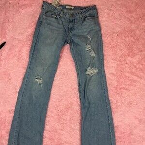 Super Low Rise Blue Distressed Levi jeans